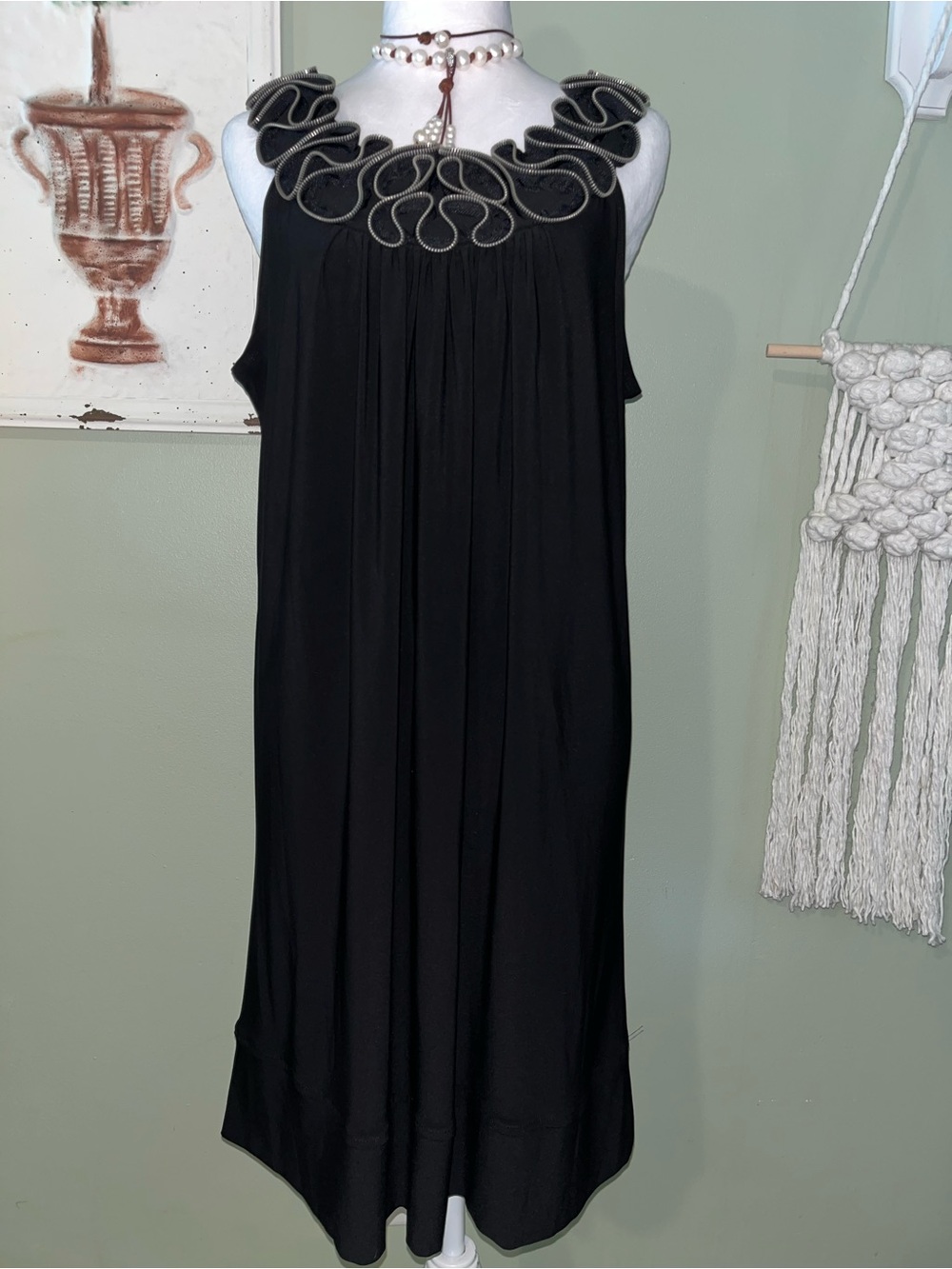 Black Sleeveless Dress with Edgy Decorative Neckline